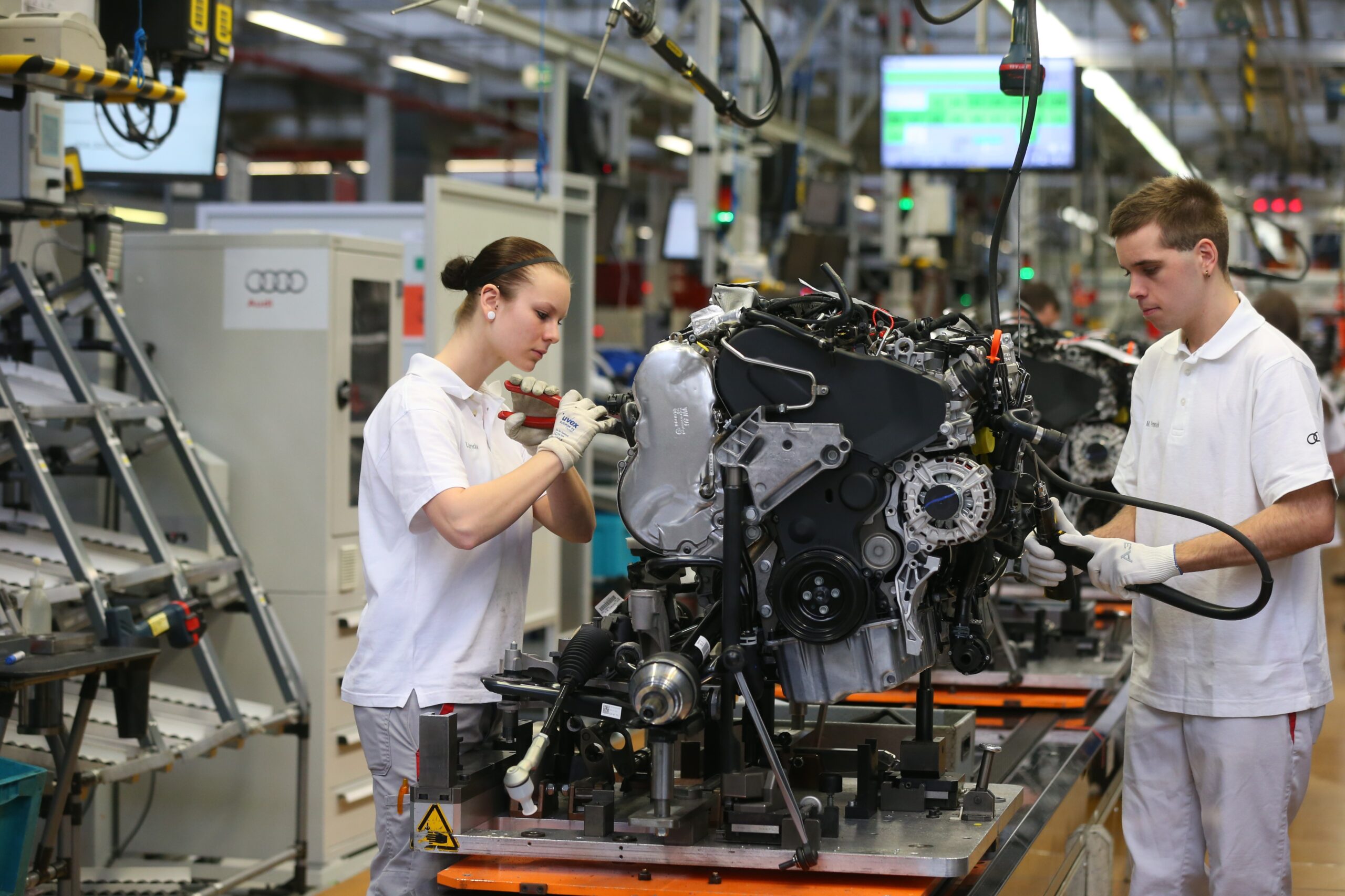 German employees, such as these workers on a car production line in Ingolstadt, put in the lowest average hours among the five big European economies