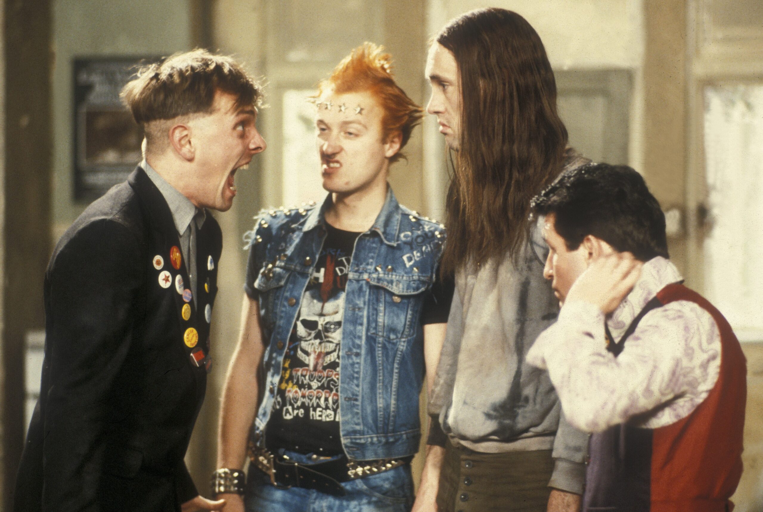 Rik Mayall, Adrian Edmondson, Nigel Planer and Christopher Ryan in The Young Ones